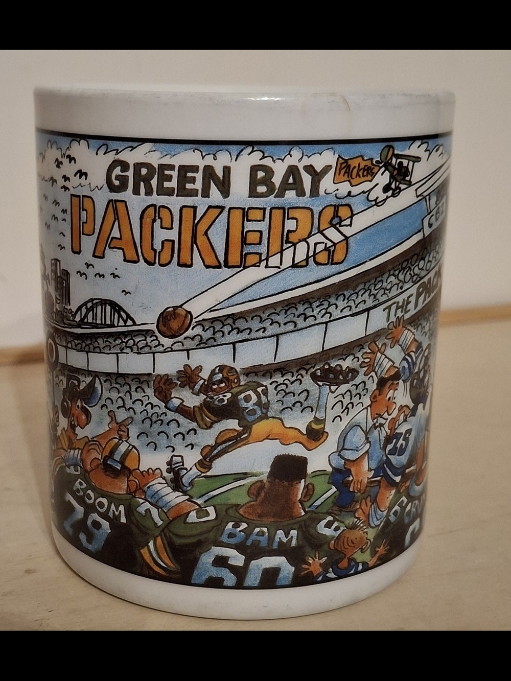 Vintage 1980s NFL Green Bay Packers Caricature ceramic coffee mug by Custom Edge